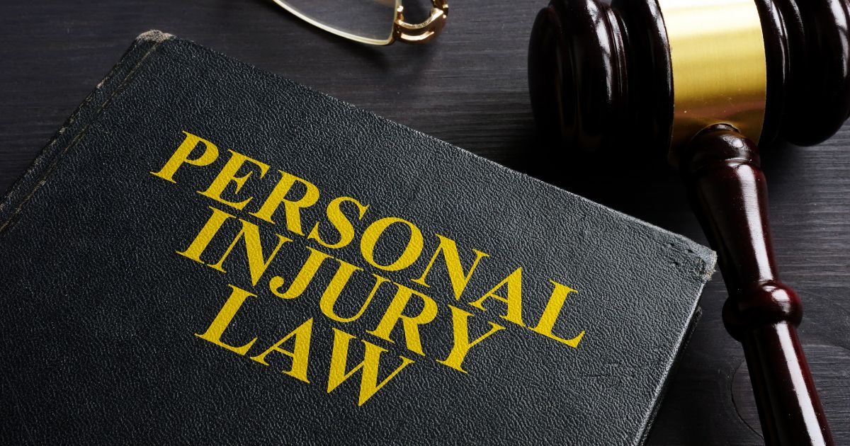 personal injury law book and gavel